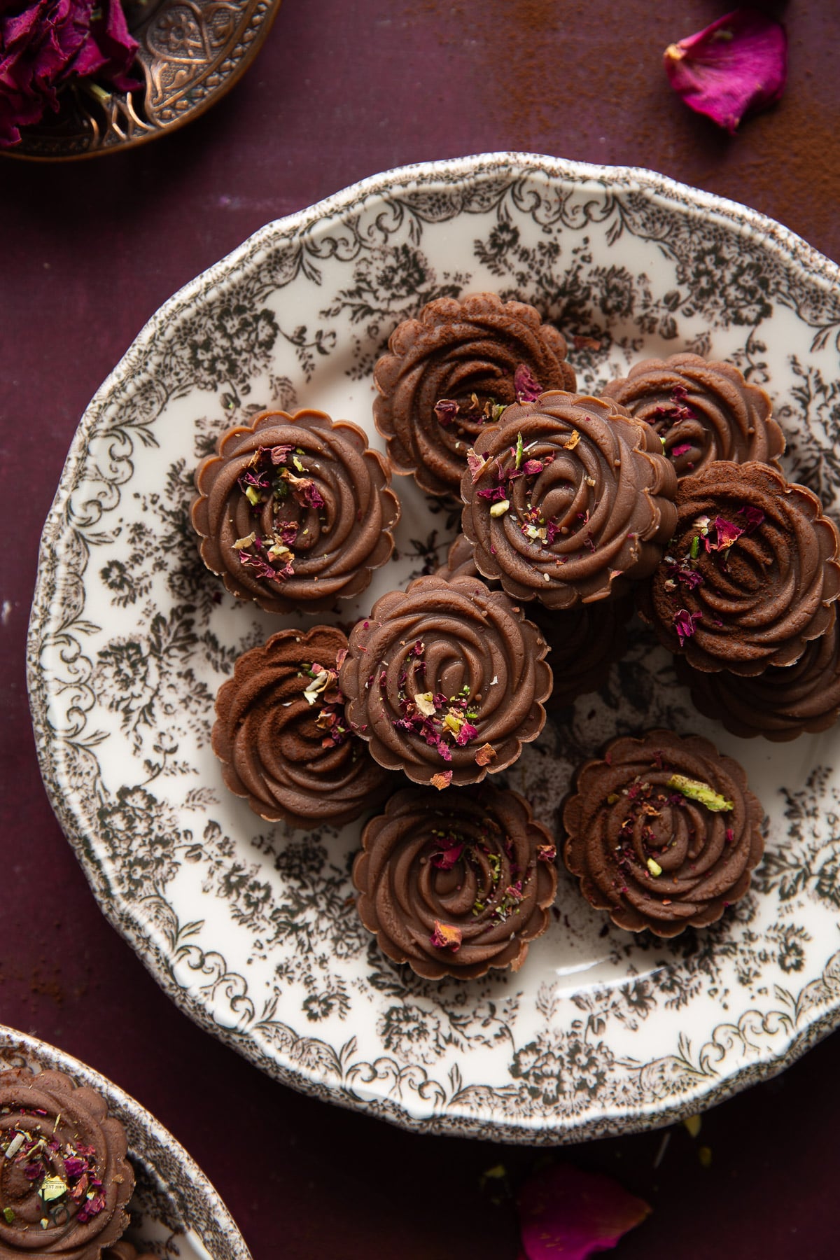 Chocolate peda arranged in a serving dish. 