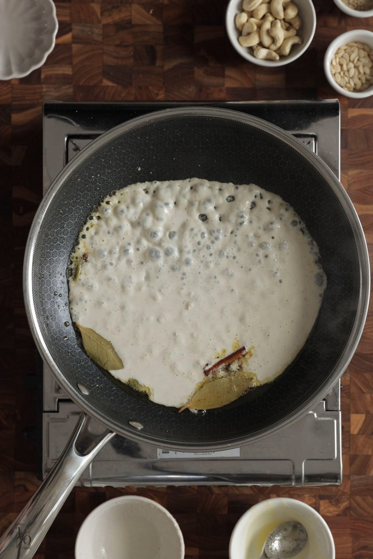 Cashew and seeds paste cooking in a pan.