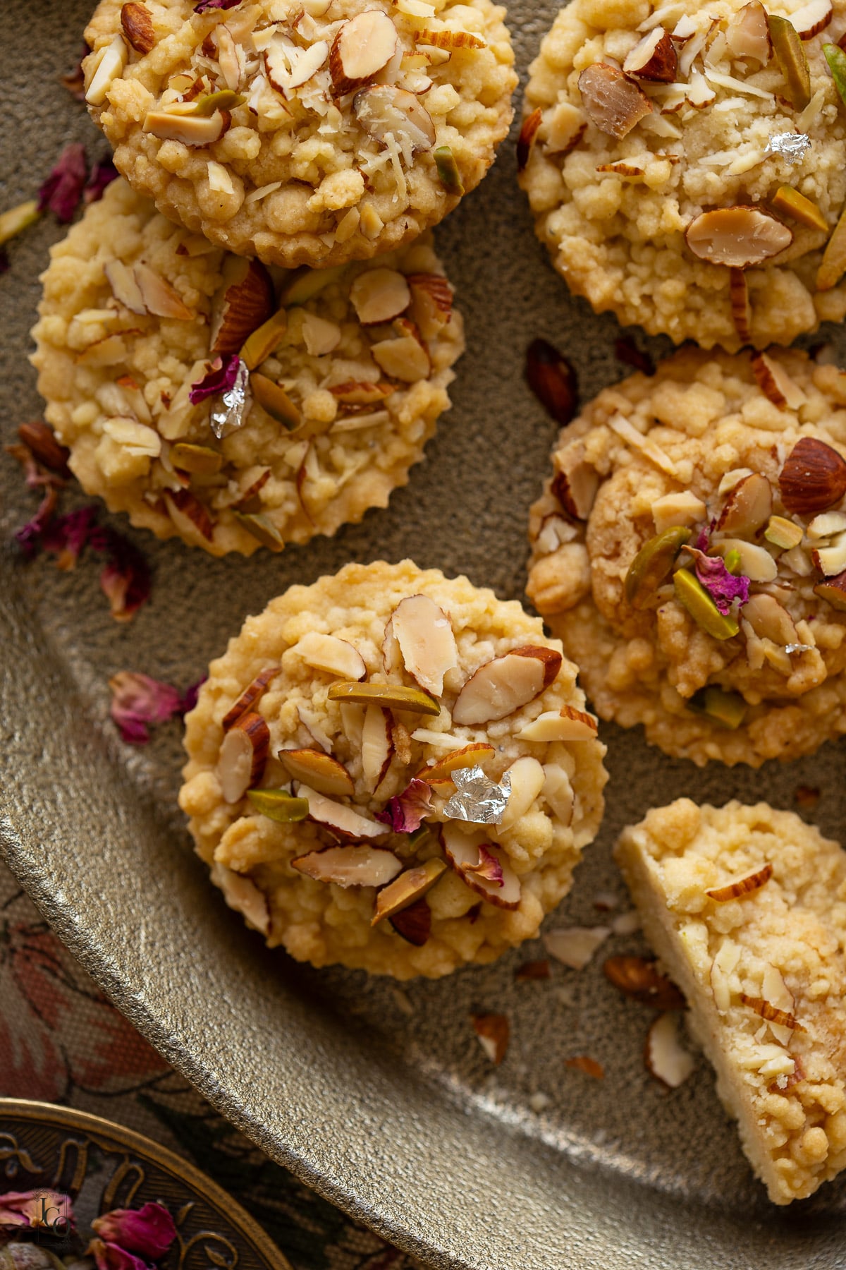 Badam halwa shortbread cookies served in a oval gold serving tray.